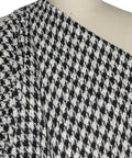 Black and white houndstooth bouclé tweed