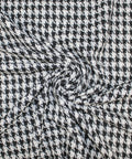 Black and white houndstooth bouclé tweed