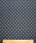 Silk crepe de chine in navy with grommet-shaped print
