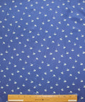 0scar silk crepe de chine in a dainty floral pattern on blue background