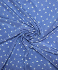 0scar silk crepe de chine in a dainty floral pattern on blue background