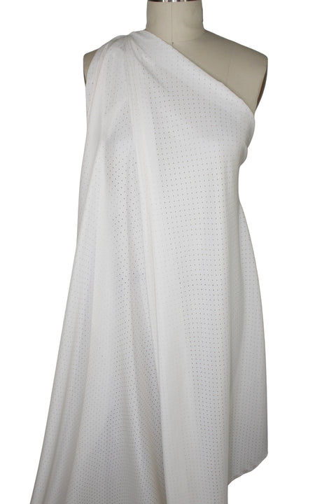 Laser pindot cut silk