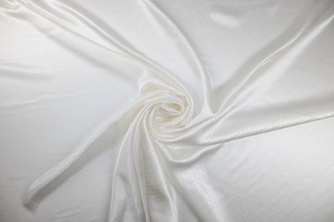 Laser pindot cut silk