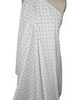 Italian cotton shirting with letters woven into it