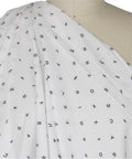 Italian cotton shirting with letters woven into it
