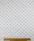 Italian cotton shirting with letters woven into it