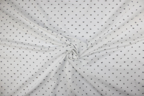 Italian cotton shirting with letters woven into it