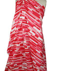 "Tile" print cotton in red tones
