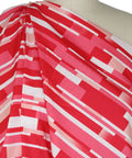 "Tile" print cotton in red tones