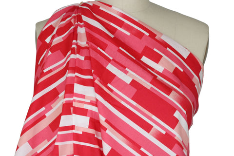 "Tile" print cotton in red tones