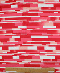 "Tile" print cotton in red tones