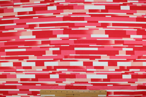 "Tile" print cotton in red tones