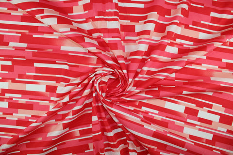"Tile" print cotton in red tones