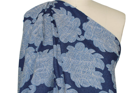 Heavily appliquéd denim