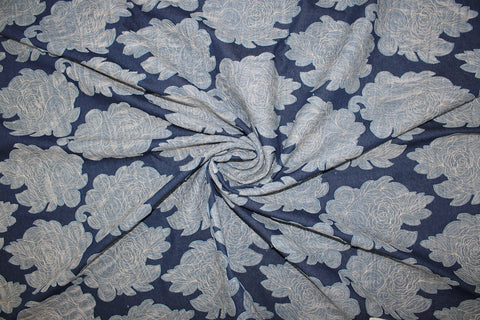 Heavily appliquéd denim