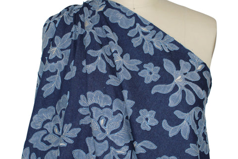 Heavily appliquéd denim