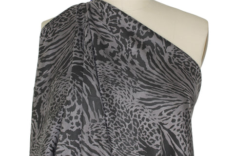 Double faced scuba knit fabric with animal print