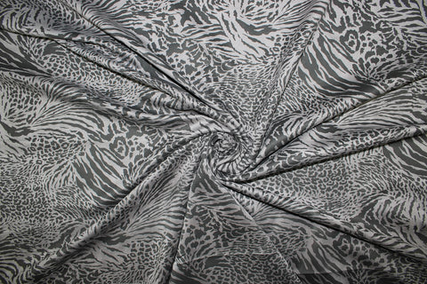 Double faced scuba knit fabric with animal print