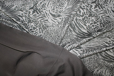 Double faced scuba knit fabric with animal print