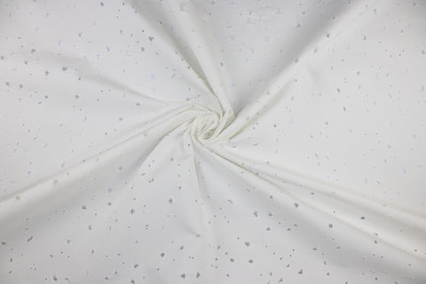 Distressed white denim fabric