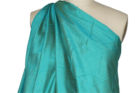 Iridescent peacock blue silk dupioni