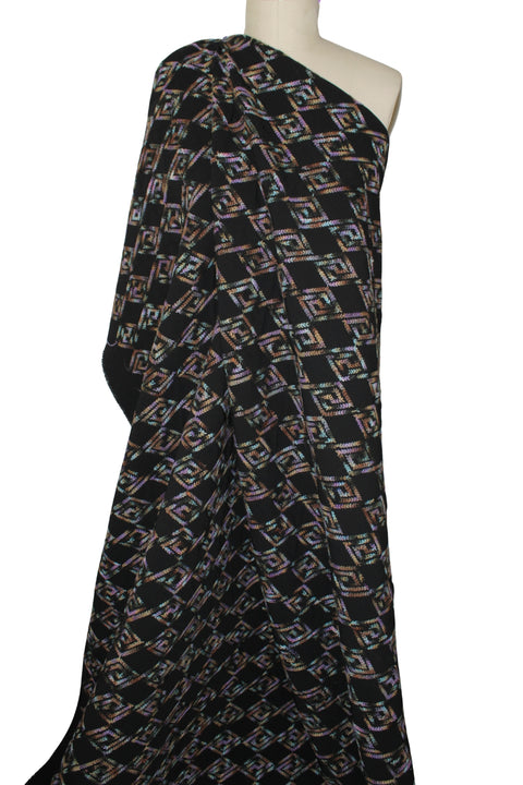 Wool embroidered quilted coating