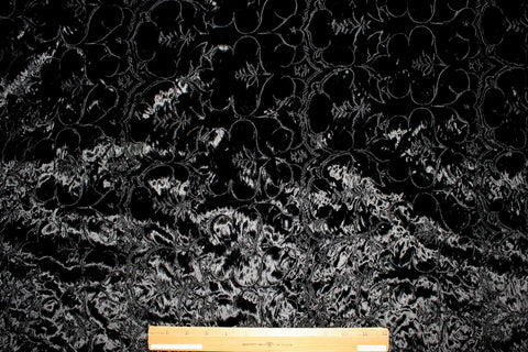 Embroidered velvet coating