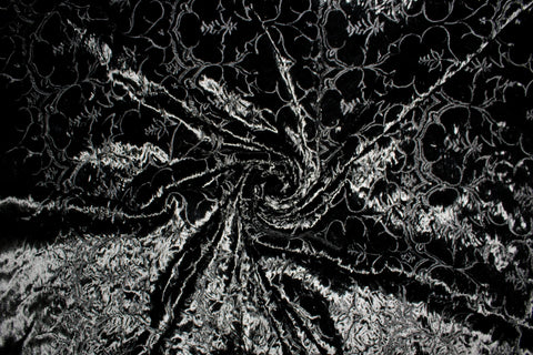 Embroidered velvet coating