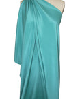 4 ply stretch silk crepe on full length mannequin teal turquoise