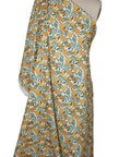 Stretch linen blend broadcloth in a citrus print