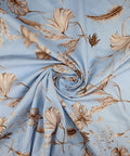 Leaf print linen in browns on blue