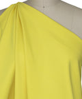 Bright yellow rayon double knit fabric