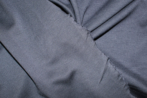 Textured navy rayon double knit showing the textured side and the smooth side