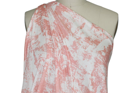 closeup of rayon jersey printed fabric draped on mannequin