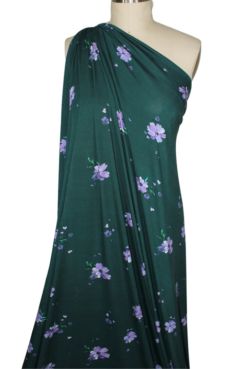 Flower print rayon jersey in purple on green