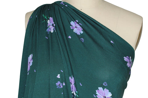 Flower print rayon jersey in purple on green