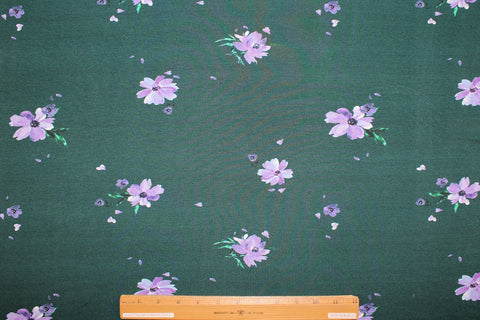 Flower print rayon jersey in purple on green