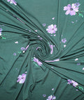 Flower print rayon jersey in purple on green