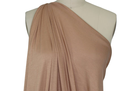 https://gorgeousfabrics.com/products/italian-selvage-handkerchief-linen-pinky-tan?_pos=1&_sid=b64095069&_ss=r