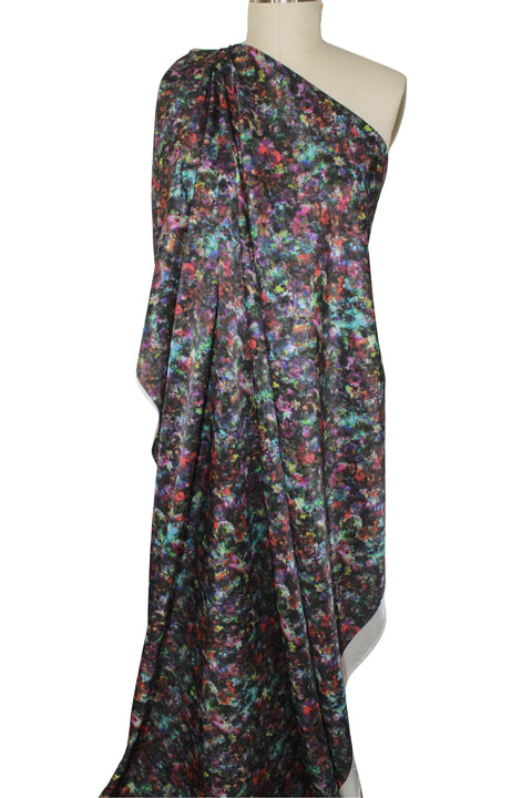 Heavy silk with a jewel tone print that looks like a star filled sky