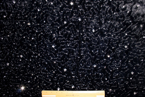 Sequin/bead embellished faux fur