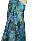 0scar silk gazar in a floral print that is watery and abstract