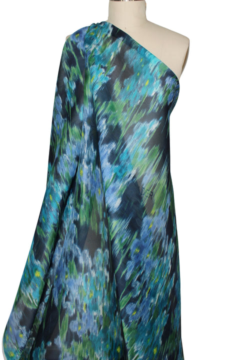 0scar silk gazar in a floral print that is watery and abstract