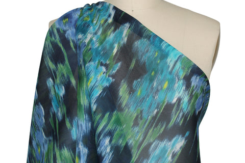 0scar silk gazar in a floral print that is watery and abstract
