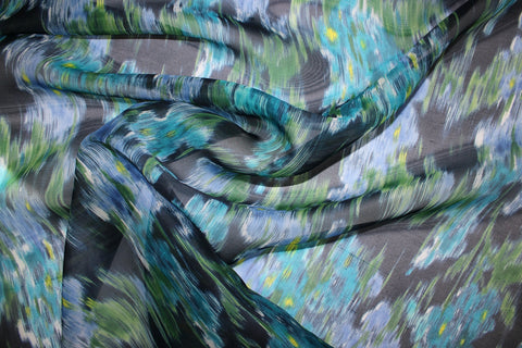 0scar silk gazar in a floral print that is watery and abstract