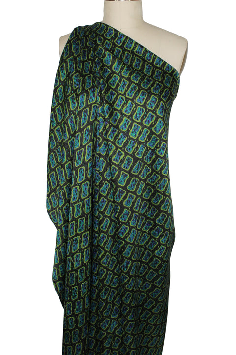 silk charmeuse with an almost paramecium-like print in jewel colors
