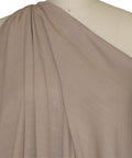 Closeup of viscose double knit fabric, tan side, on mannequin