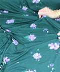 Flower print rayon jersey in purple on green