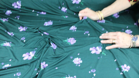 Flower print rayon jersey in purple on green