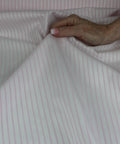 Pinstriped cotton shirting in pink on white